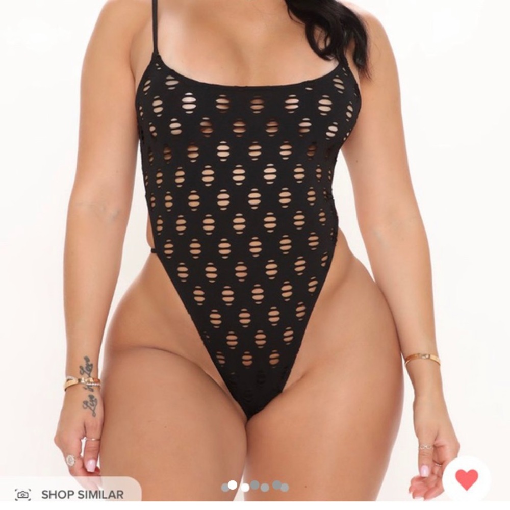 BRAND NEW 

Cut out body suit